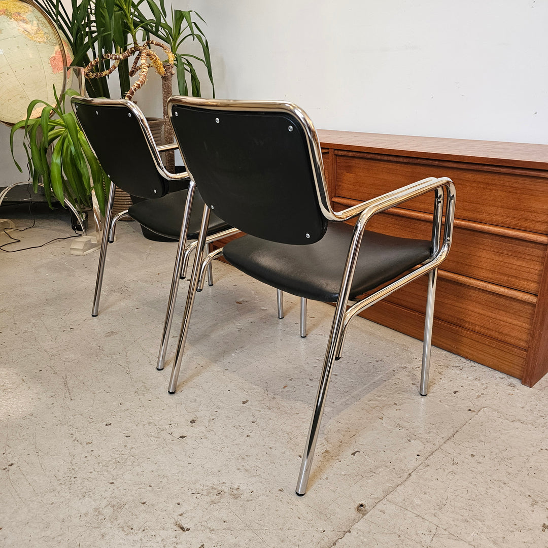 Pair of MCM Tubular Chrome & Black Vinyl Armchairs